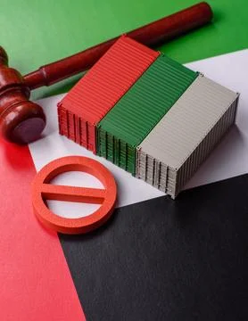The cargo container ban on the UAE flag as a conceptual backdrop. The cargo.. Stock Photos