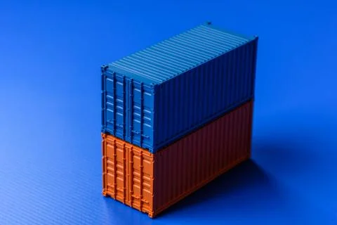 A cargo container in a port warehouse as a logistics element, export. A car.. Stock Photos