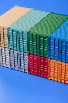 A cargo container in a port warehouse as a logistics element, export. A car.. Stock Photos