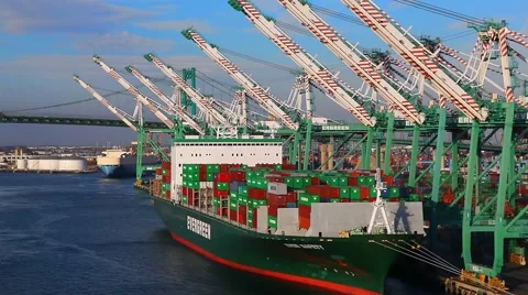 Cargo Container Ship and sea port next to Vincent Thomas Bridge in San Pedro Stock Footage 61746633