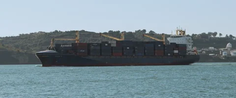 Cargo container ship approaching port Stock Footage 152857495