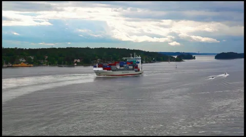 Cargo container ship crosses the harbor going to Stockholm in Sweden Video stock 27813979