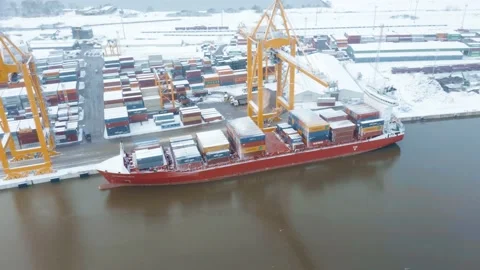 Cargo Container Ship Loading in Winter Snowy Port (Harbor) Video stock 170389289