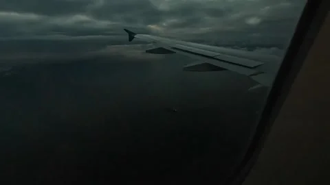 Cargo, container ship in the middle of sea from airplane window Video stock 220875183