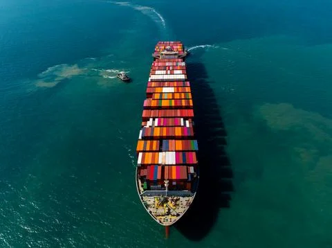 Cargo Container Ship Navigating Blue Ocean Water Near Laem Chabang High Ang.. Stock-Fotos