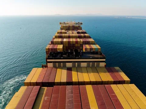 Cargo Container Ship Navigating Calm Open Sea Waters In Si Racha Thailand E.. Fotos de archivo