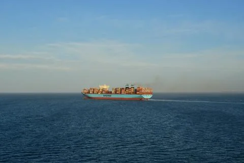 Cargo container ship at sea export freight vessel Stock Photos