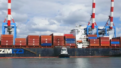 Cargo container ship side at port 4k intro video for business Stock Footage 105466591