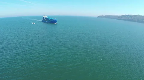 Cargo container trade ship in open sea ocean, AERIAL VIEW Stock Footage 61744394