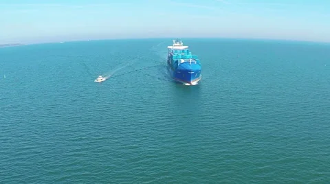 Cargo container trade ship in open sea ocean, AERIAL VIEW Stock Footage 61744457