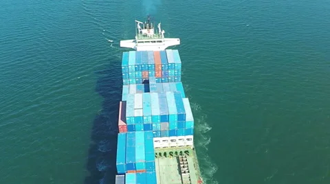 Cargo container trade ship in open sea ocean, AERIAL VIEW Stock Footage 61744649