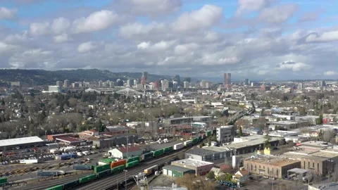 Cargo container train passing through Portland Oregon and the city center Stock-Footage 221572186