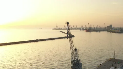 Cargo container transport ship and cranes at port industrial, sunset Stock Footage 224771305