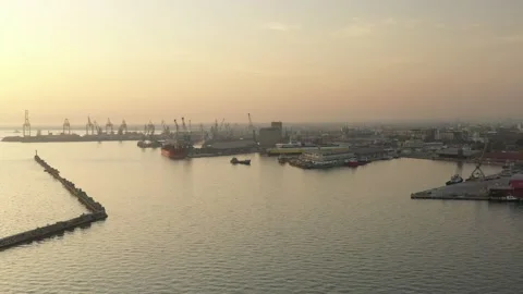 Cargo container transport ship and cranes at port industrial, sunset Stock Footage 224771702