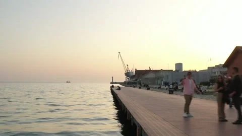 Cargo container transport ship and cranes at port industrial, sunset Stock Footage 224773338