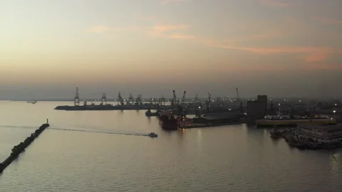 Cargo container transport ship and cranes at port industrial, sunset Stock Footage 224777995