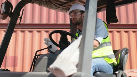Cargo container worker control forklift truck to work in workplace area Stock-Footage 146429147