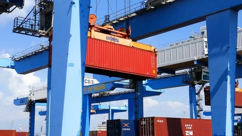 Cargo containers and container cranes 4k intro video for business Stock Footage 92140784