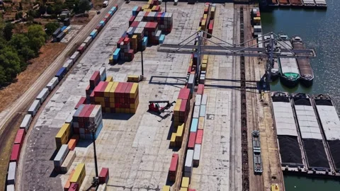 Cargo containers arranged at a shipping yard on a sunny day Stock Footage 343118326
