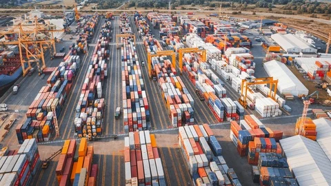 Cargo containers in busy port, aerial hyperlapse. Shipping harbor, logistics Stock Footage