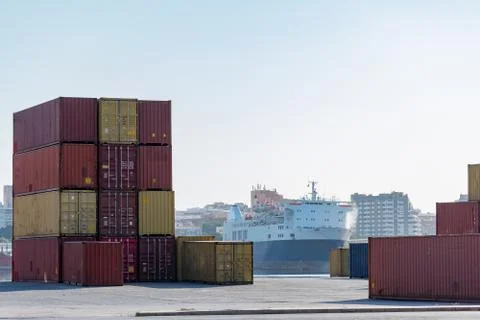 Cargo containers for export and import in maritime terminal. Stock Photos