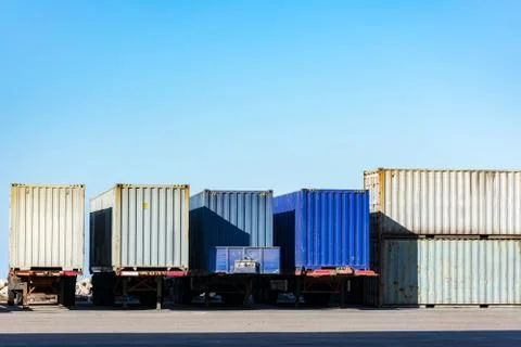 Cargo containers for export and import in maritime terminal. Foto stock