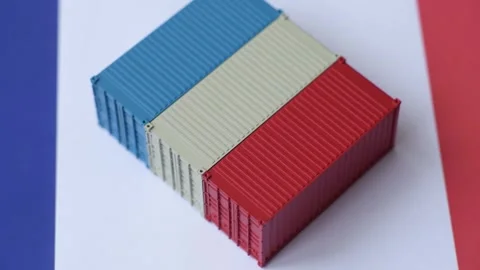 Cargo containers on the French flag as a conceptual backdrop for goods export an Stock Footage 346551828