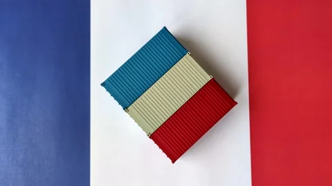 Cargo containers on the French flag as a conceptual backdrop for goods export an Stock Footage 346552034