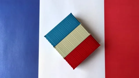 Cargo containers on the French flag as a conceptual backdrop for goods export an Stock Footage 346552038