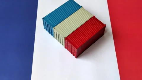 Cargo containers on the French flag as a conceptual backdrop for goods export an Stock Footage 346552040