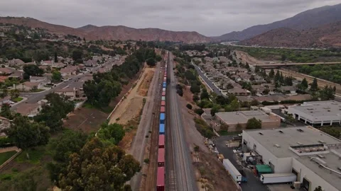 Cargo containers loaded on train in southern California. 動画素材 165465452