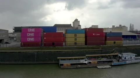 Cargo Containers Stacked next to a Ship Stock Footage 150793683
