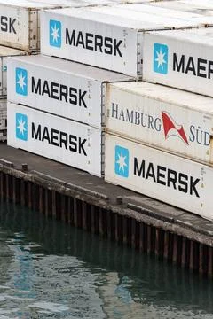 Cargo containers stacked, organized algorithmic on pier in terminal seapor... Foto stock