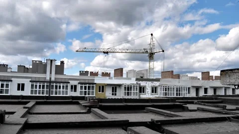 Cargo crane on the background of high-rise buildings Stock Footage 211822046