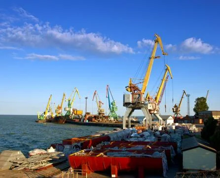 Cargo crane in the pier Stock Photos