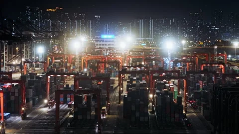 Cargo Cranes Loading And Unloading Containers At Night Stock Footage 337387931