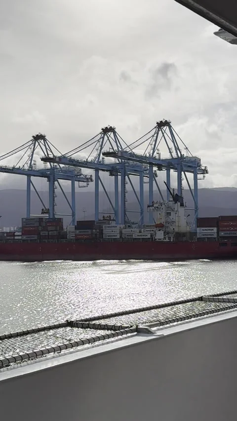 Cargo cranes loading a ship at Algeciras Port by the south of Spain Stock Footage 311453221