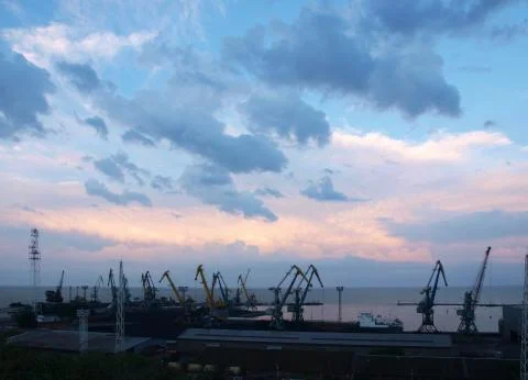 Cargo cranes in the pier Stock Photos
