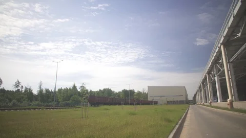 Cargo delivery by train to the big hangar, business Stock Footage 115052459