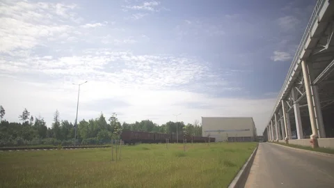 Cargo delivery by train to the big hangar, business Stock Footage 115052469
