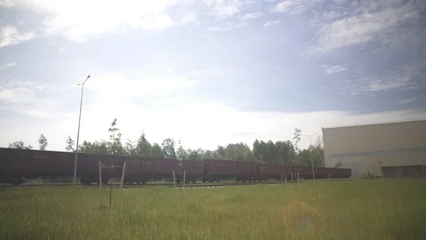 Cargo delivery by train to the big hangar, business Stock Footage 115052485