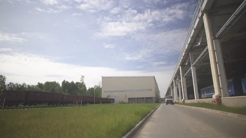 Cargo delivery by train to the big hangar, business Stock Footage 115052490