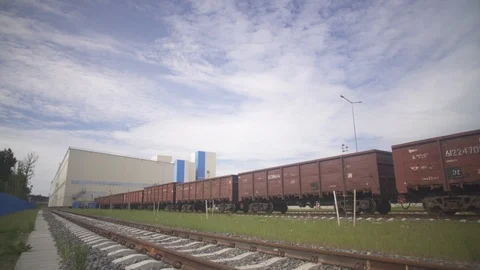 Cargo delivery by train to the big hangar, business Stock Footage 115052524