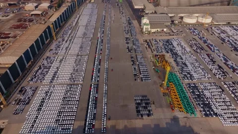 Cargo dock with thousands of parked vehicles, Thailand Stock Footage 303501946