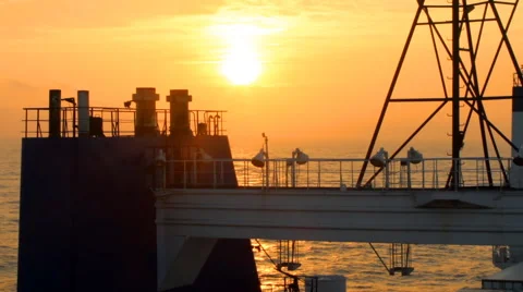 Cargo ferry at sunset Stock Footage 49306163