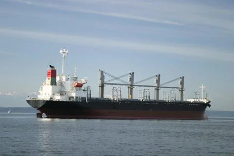 Cargo freighter at anchor Stock Photos