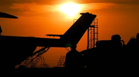 Cargo helicopters at sunset 1 Stock Footage 11149543