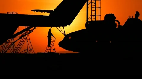 Cargo helicopters at sunset 3 Stock Footage 11149555