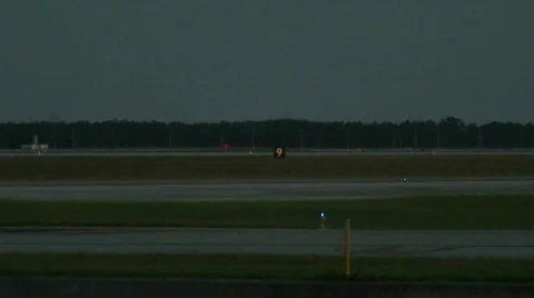 Cargo jet in background at dusk 2 Stock Footage 112618