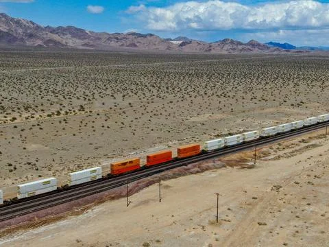 Cargo locomotive railroad engine crossing Arizona desert wilderness. USA C... Stock Photos